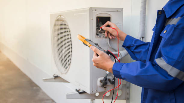 istock Technician checking the operation of the air conditioner 1398418453