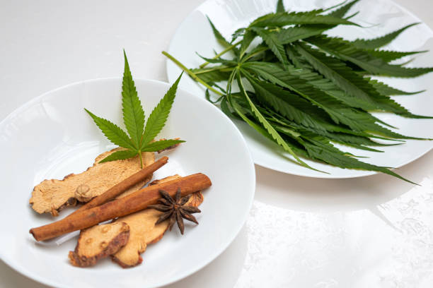 istock Cannabis leaves and spices for cooking 1398423999