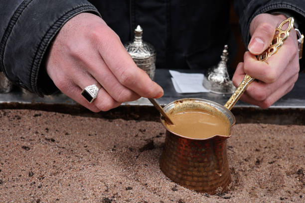 istock person holding a Turkish coffee pot 1398424238