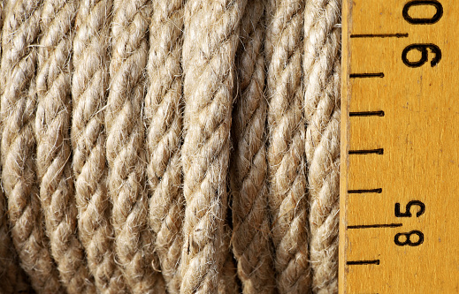 close-up of a rope with  wooden ruler