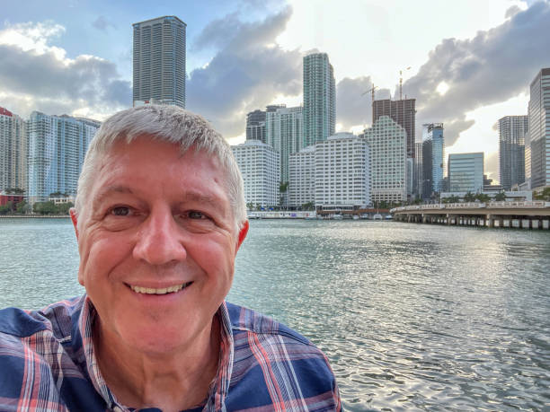 istock Senior man portrait at Miami waterfront skyline 1398428274