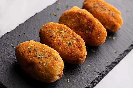 Close up of tapa of croquetas or croquettes on table