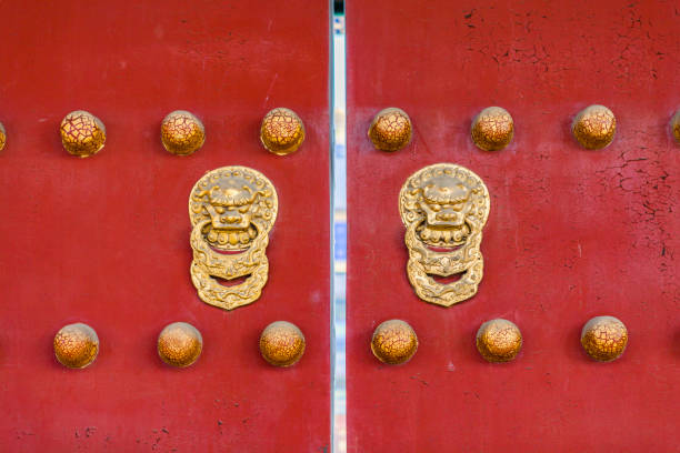 istock Chinese red door with copper lion 1398441787