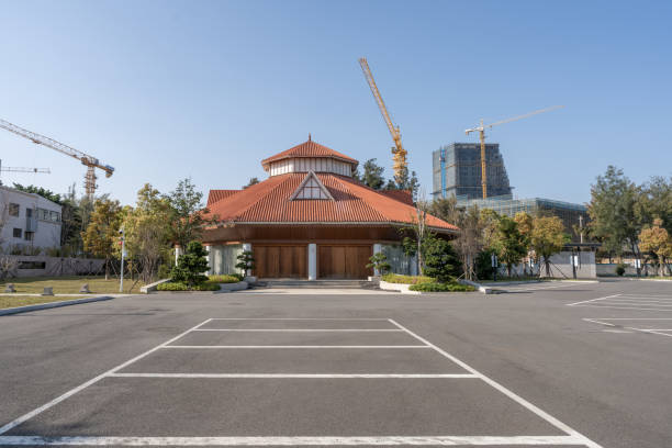 Empty parking lot and front building