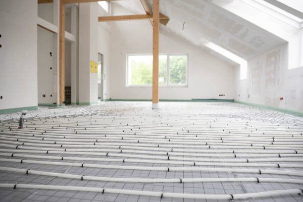 istock Shot of construction site in a loft where floor heating has just been installed 1398447319
