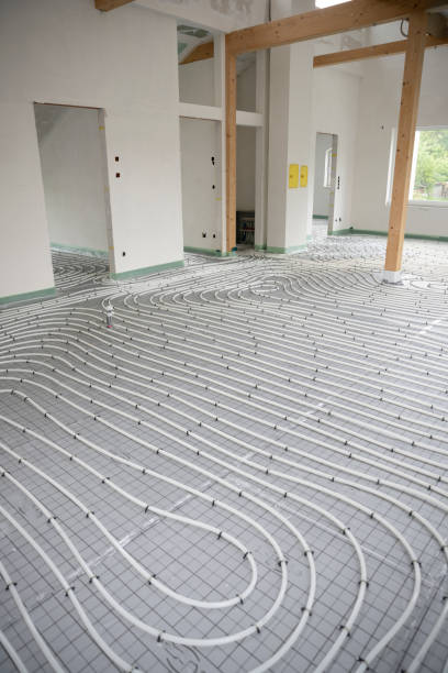 istock Shot of construction site in a loft where floor heating has just been installed 1398449318