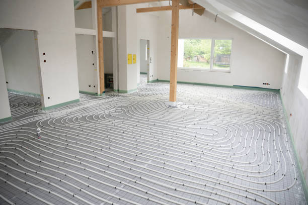 istock Shot of construction site in a loft where floor heating has just been installed 1398449504