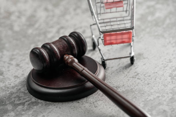 istock Shopping cart and mallet 1398450692