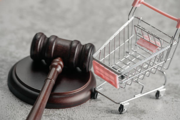 istock Shopping cart and mallet 1398450706