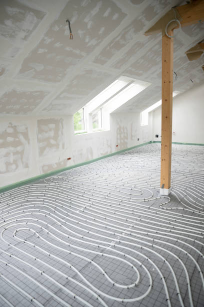 istock Shot of construction site in a loft where floor heating has just been installed 1398450786