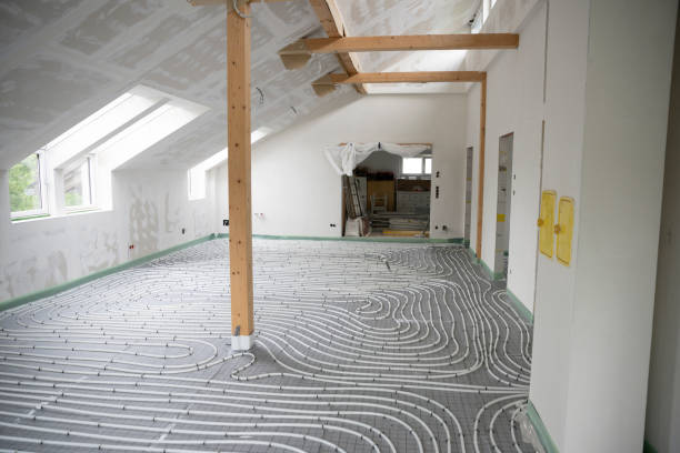 istock Shot of construction site in a loft where floor heating has just been installed 1398450833