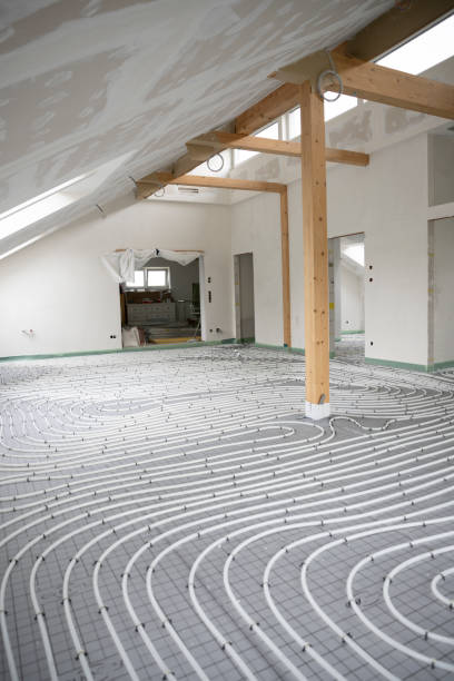 istock Shot of construction site in a loft where floor heating has just been installed 1398452548