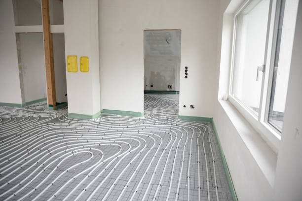 istock Shot of construction site in a loft where floor heating has just been installed 1398453269
