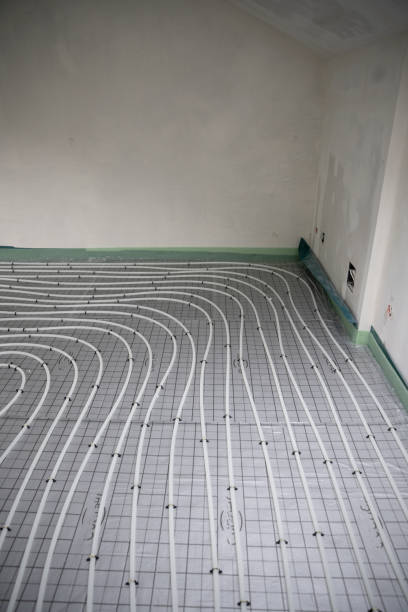 istock Shot of construction site in a loft where floor heating has just been installed 1398453456