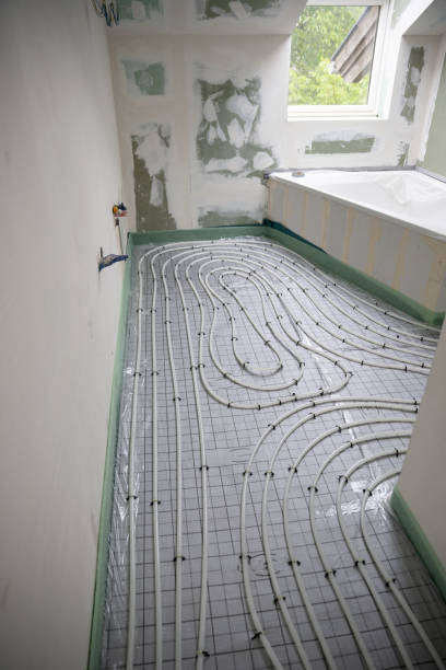 istock Shot of construction site in a loft where floor heating has just been installed 1398453651