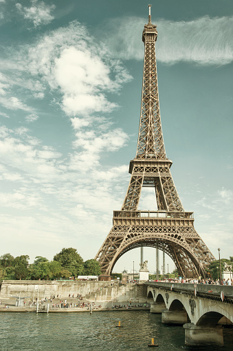 Seine river and Eiffel tower in Paris France. Retro style toned picture