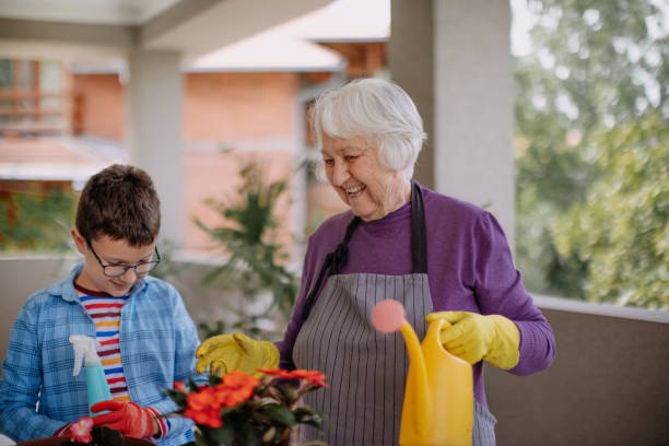 istock Multi generation family potting flower 1398454910