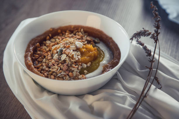 istock Delicious and healthy smoothie bowl in an intimate and refined setting. 1398455976