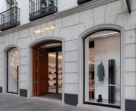 Madrid, Spain - 26th April 2022. Shop front of the Saint Laurent luxury fashion and accessories shop in Calle Serrano, Madrid, Spain. Saint Laurent is a French multinational company headquartered in Paris.
