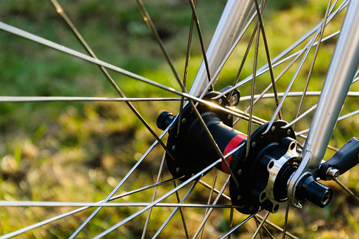 close up hub and spokes of vintage bicycle fixed gear