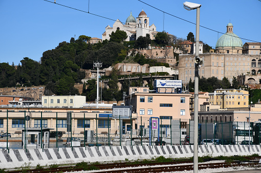 Ancona, Italy - December 15, 2019: View from the port, with Ancona Cathedral on the hilltop.