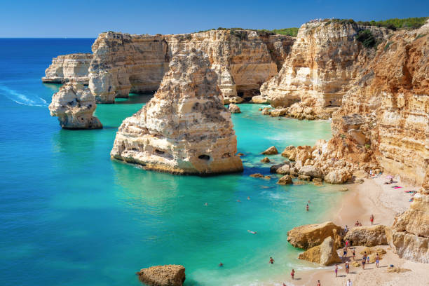 Spectacular cliff beach of Praia da Marinha in Algarve, Portugal. Spectacular cliff beach of Praia da Marinha in Algarve, Portugal. praia da marinha stock pictures, royalty-free photos & images