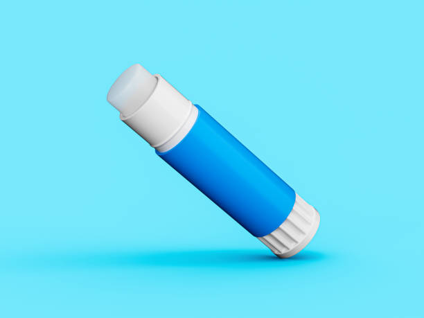 istock Open paper glue stick on blue background 3d illustration 1398474751