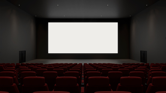 movie theater with white screen and empty red seat