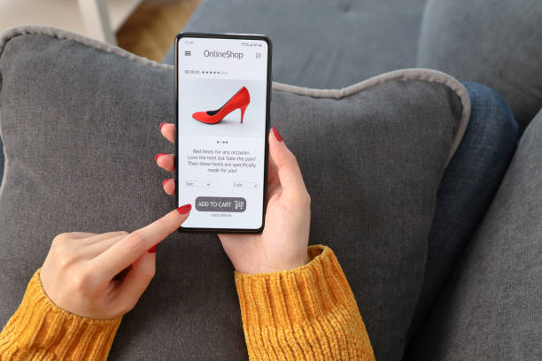 istock Shopping shoes, high heels online with e-commerce app concept. 1398475898
