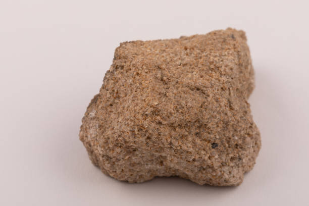 istock sedimentary sandstone rock sample- coarse, rounded and well sorted quartz grains 1398477354