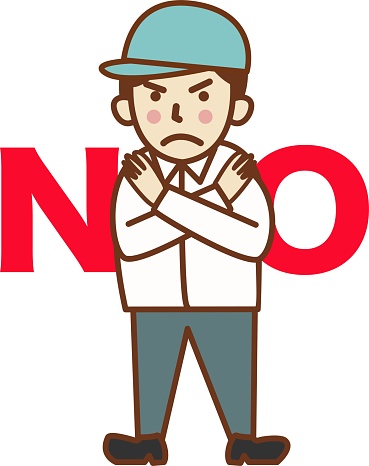 A male worker in a hat in a banned pose.