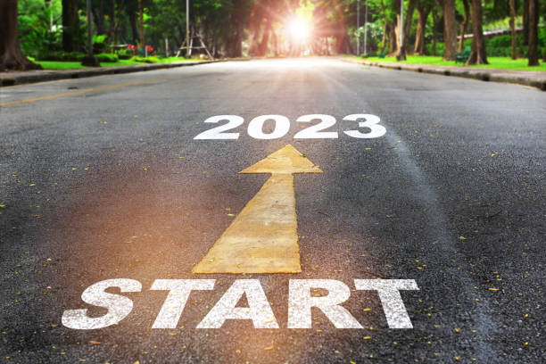 Start to 2023  written on the road on nature background with sunlight Business planning concept and new year beginning success idea 2023 photos stock pictures, royalty-free photos & images