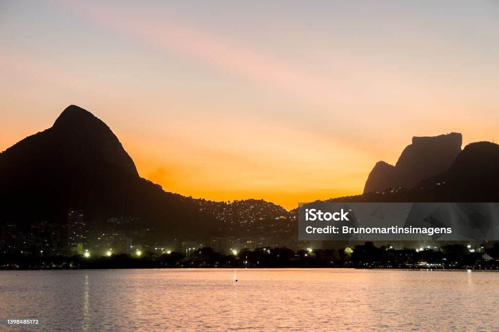 Sunset at Rodrigo de Freitas Lagoon in Rio de Janeiro. Sunset at Rodrigo de Freitas Lagoon in Rio de Janeiro, Brazil. Architecture Stock Photo
