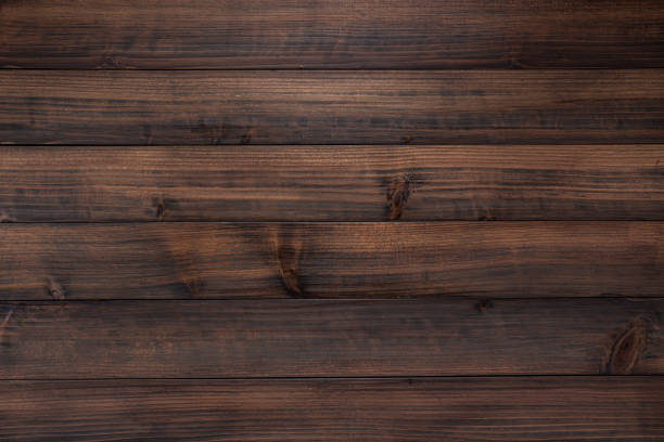 Close-up of textured brown wooden board. Cedar board has complicated annual rings and is interesting. cryptomeria japonica stock pictures, royalty-free photos & images