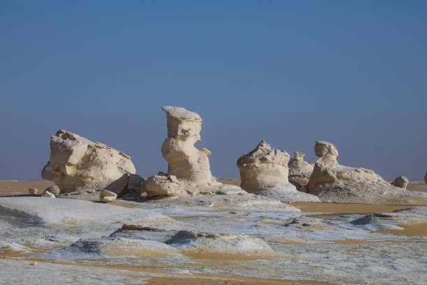 istock White Desert Sand Formations looks like two Sphinx 1398490234
