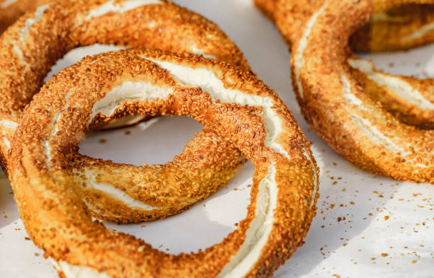 Simits Turkish, bakery products, sesame bagels simit, cooked  in bulk. Simits Turkish, bakery products, sesame bagels simit, cooked  in bulk. turkish bagel simit stock pictures, royalty-free photos & images