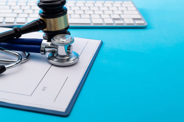 istock Gavel and stethoscope on blue background 1398491704