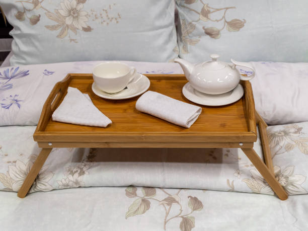 istock tray with cup and teapot in the bed 1398492147