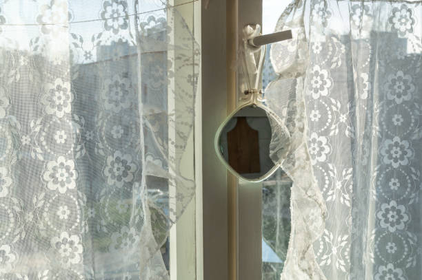 istock Window in the kitchen curtained with tulle 1398492172