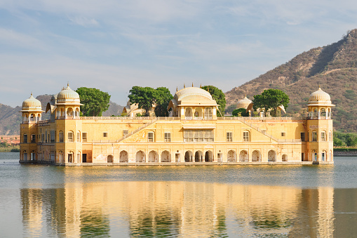 Awesome view of Jal Mahal (Water Palace) in the middle of the Man Sagar Lake in Jaipur, Rajasthan, India. Amazing Rajput style of architecture. Jaipur is a popular tourist destination of South Asia.