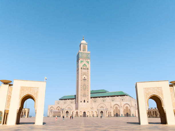 Casablanca's Monumental Hassan II Mosque - Plaza and Minaret Casablanca's Monumental Hassan II Mosque - Plaza and Minaret casablanca stock pictures, royalty-free photos & images