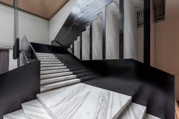 Wooden light brown stairs in modern house interior business