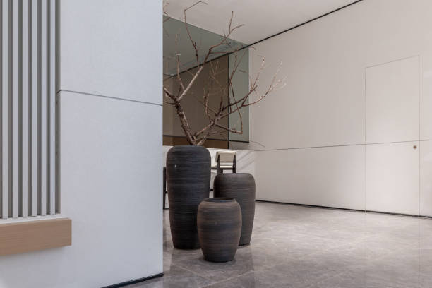 istock Several pots filled with dead branches at a corner of the indoor space 1398497551