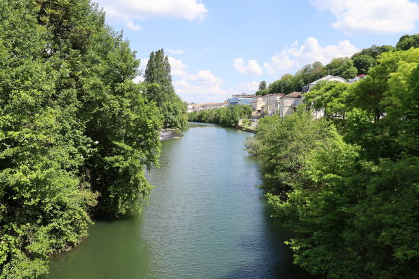 Angouleme - Le fleuve Charente The Charente River in Angouleme, town of Angouleme, Charente department, France angouleme stock pictures, royalty-free photos & images