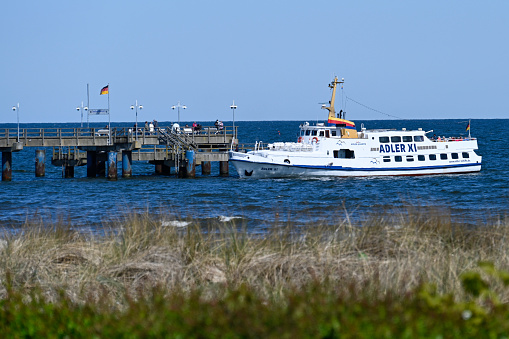 Bansin, Germany, May 9, 2022 - Passenger boat Adler XI at the pier of Bansin on the island of Usedom
