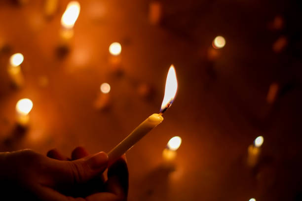 istock Candle light in the dark , Candle light background 1398500514