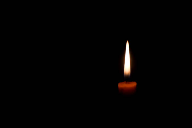 istock Candle light in the dark , Candle light background 1398500562