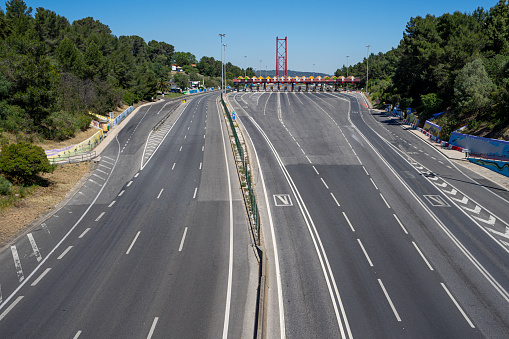toll plaza of the 25 de Abril suspension bridge over the Tagus River observed in depth
