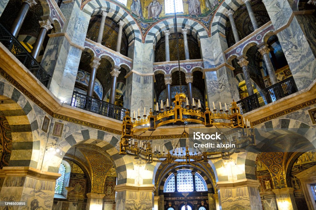 Barbarossa Chandelier in Aachen Cathedral The Barbarossa chandelier installed under the cupola of the Palatine Chapel in Aachen Cathedral, Germany Aachen Stock Photo