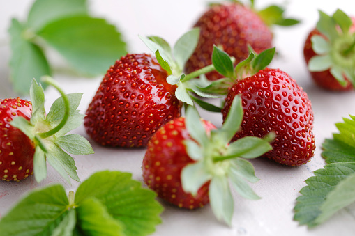 Fresh organic strawberries with leaves